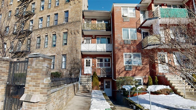 2955 Ocean Pkwy Unit 2F, Brooklyn, NY 11235 - snow covered building featuring a view of apartment building / complex and stairs