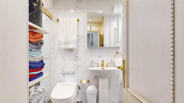 2955 Ocean Pkwy Unit 2F, Brooklyn, NY 11235 - bathroom with toilet and tile walls