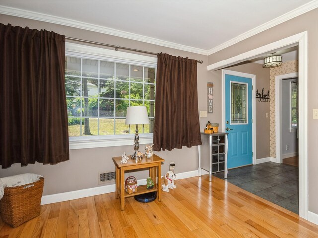 1760 Rte 199, Stanfordville, NY 12581 - living area with baseboards, crown molding, and wood finished floors