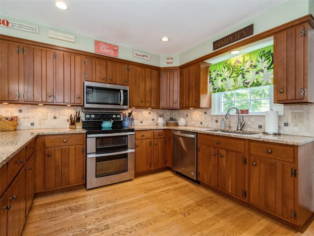 1760 Rte 199, Stanfordville, NY 12581 - kitchen featuring stainless steel appliances, a sink, brown cabinetry, and recessed lighting