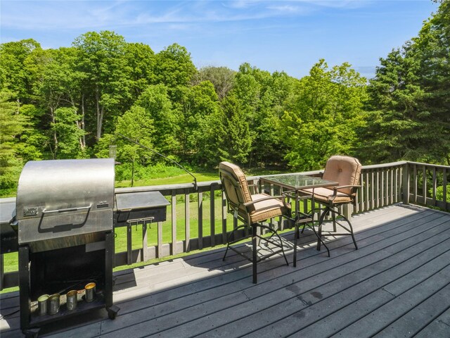 1760 Rte 199, Stanfordville, NY 12581 - deck featuring a grill, a wooded view, and a lawn
