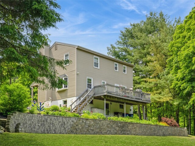 1760 Rte 199, Stanfordville, NY 12581 - back of house featuring a deck, stairs, and a lawn