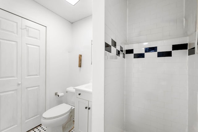 5922 Post Rd, Bronx, NY 10471 - bathroom with vanity, toilet, tiled shower, and a closet