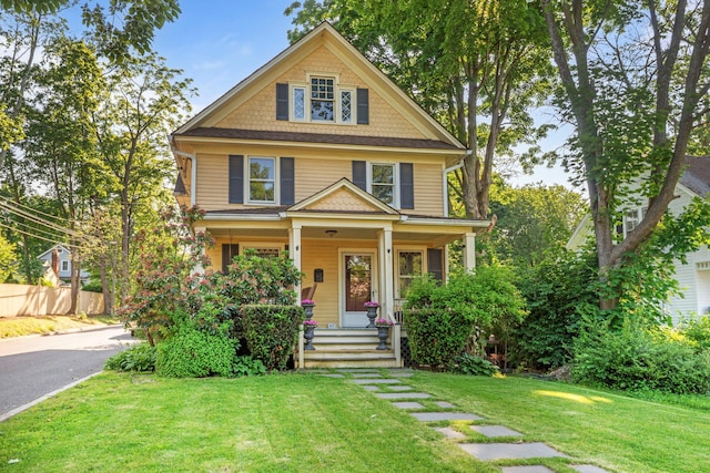 67 W Neck Rd, Huntington, NY 11743 - view of front of house with covered porch and asphalt driveway