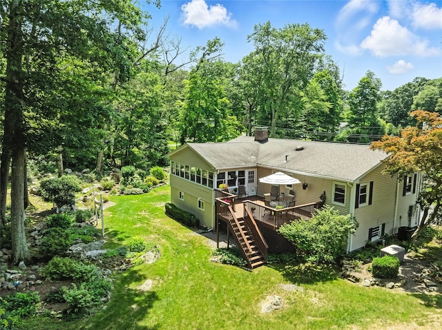 69 Clove Brook Dr, Cold Spring, NY 10516 - back of property featuring stairway, a wooden deck, a sunroom, and roof with shingles