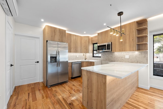 14428 Farmers Blvd, Rochdale, NY 11434 - kitchen featuring appliances with stainless steel finishes, a wall mounted air conditioner, light wood-style floors, decorative backsplash, and recessed lighting