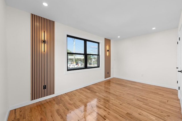 14428 Farmers Blvd, Rochdale, NY 11434 - spare room with light wood-type flooring, recessed lighting, and baseboards