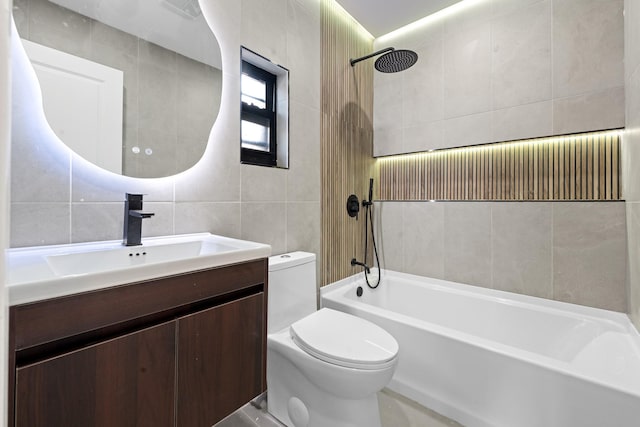 14428 Farmers Blvd, Rochdale, NY 11434 - bathroom featuring tile walls, toilet, vanity, and washtub / shower combination
