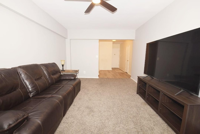 16 Main St Unit 3K, East Rockaway, NY 11518 - living room with ceiling fan, carpet floors, and baseboards