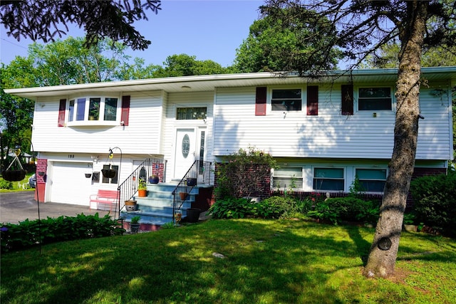 188 N Middletown Rd, Nanuet, NY 10954 - bi-level home featuring a front yard, driveway, and an attached garage
