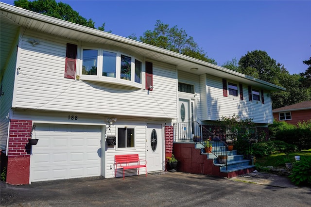 188 N Middletown Rd, Nanuet, NY 10954 - bi-level home with brick siding and a garage