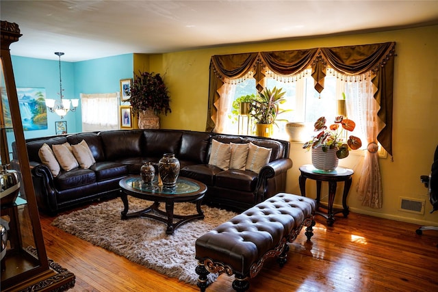 188 N Middletown Rd, Nanuet, NY 10954 - living area featuring a chandelier, wood finished floors, and baseboards