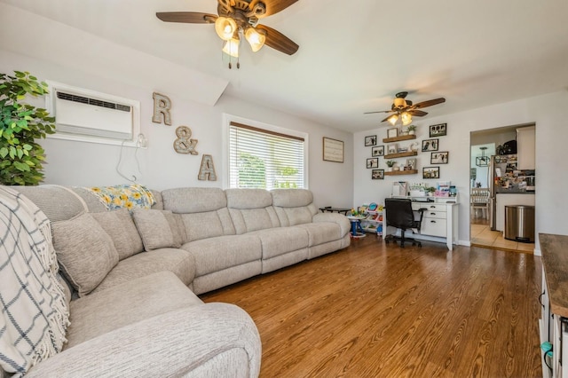 203 E Shore Rd, Lindenhurst, NY 11757 - living room with ceiling fan, wood finished floors, a desk, and a wall mounted AC