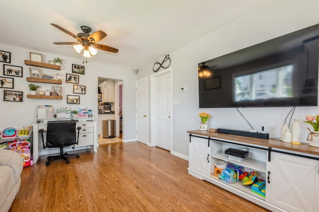 203 E Shore Rd, Lindenhurst, NY 11757 - home office with a ceiling fan, light wood-type flooring, and baseboards