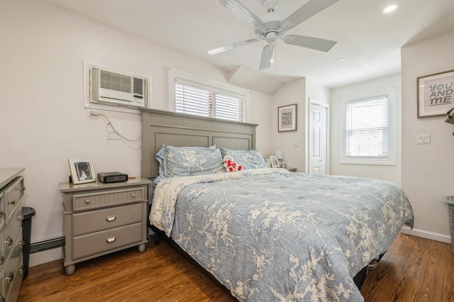 203 E Shore Rd, Lindenhurst, NY 11757 - bedroom featuring multiple windows, baseboards, wood finished floors, a wall unit AC, and recessed lighting