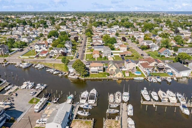 203 E Shore Rd, Lindenhurst, NY 11757 - aerial overview of property's location featuring a large body of water and nearby suburban area