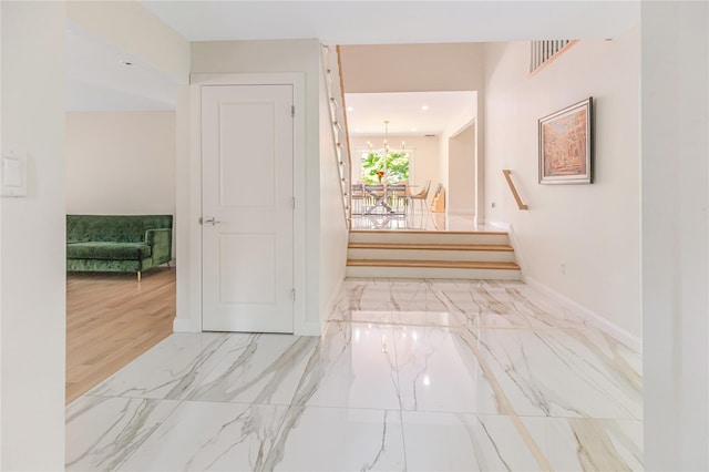 34 Winesap Ln, Monsey, NY 10952 - hallway featuring marble finish floors, baseboards, and stairway