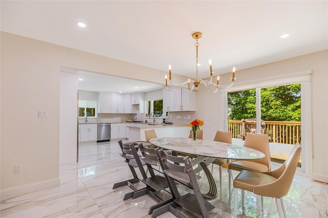 34 Winesap Ln, Monsey, NY 10952 - dining space with light marble finish flooring, baseboards, recessed lighting, and a chandelier
