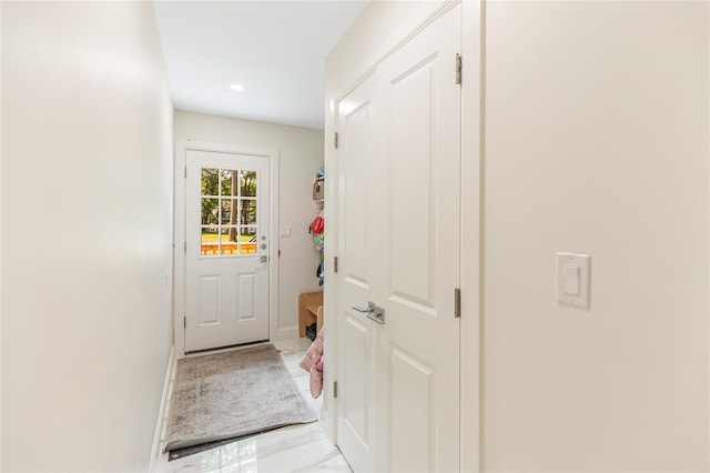 34 Winesap Ln, Monsey, NY 10952 - doorway to outside featuring light marble finish floors, recessed lighting, and baseboards