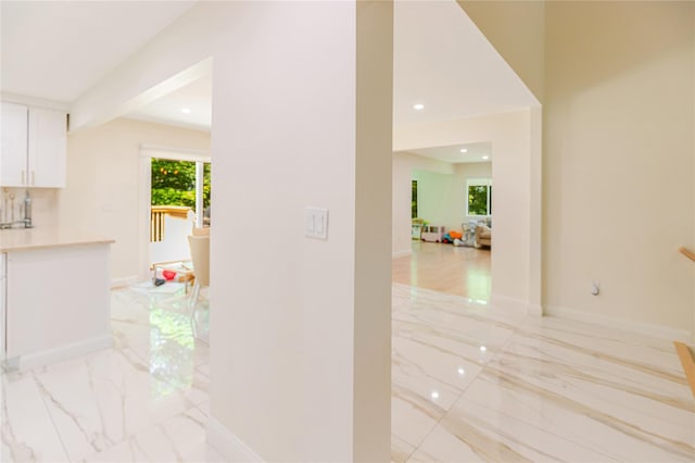 34 Winesap Ln, Monsey, NY 10952 - hall featuring light marble finish floors, baseboards, and recessed lighting