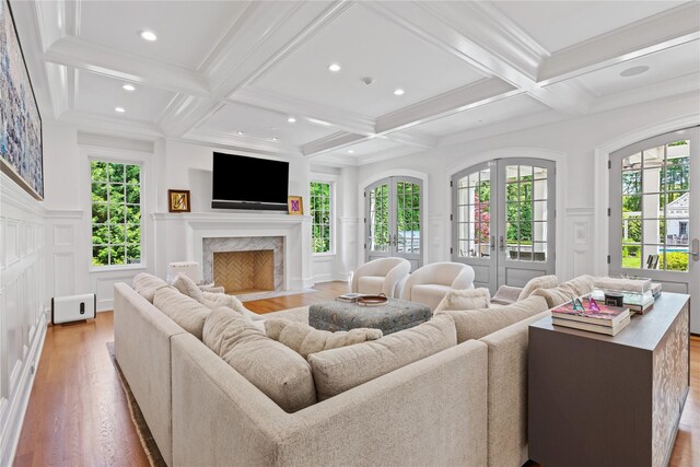 22 Terrace Ct, Old Westbury, NY 11568 - living room with a decorative wall, coffered ceiling, light wood-style floors, beamed ceiling, and recessed lighting