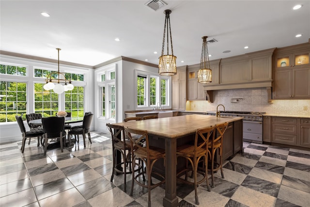 22 Terrace Ct, Old Westbury, NY 11568 - kitchen with high end stove, ornamental molding, light countertops, decorative backsplash, and glass insert cabinets