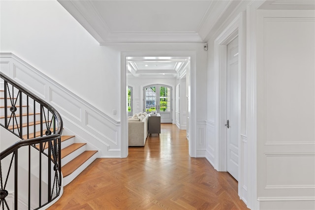 22 Terrace Ct, Old Westbury, NY 11568 - foyer entrance with a decorative wall, stairs, ornamental molding, and wainscoting