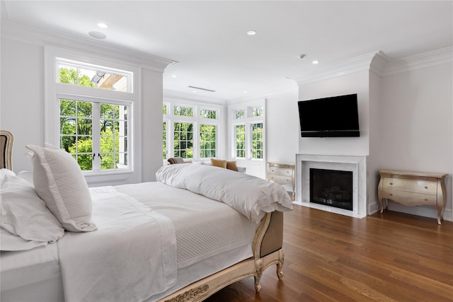 22 Terrace Ct, Old Westbury, NY 11568 - bedroom featuring crown molding, dark wood-style flooring, recessed lighting, and a fireplace with flush hearth