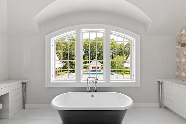 22 Terrace Ct, Old Westbury, NY 11568 - bathroom with vanity, a freestanding bath, and tile patterned floors