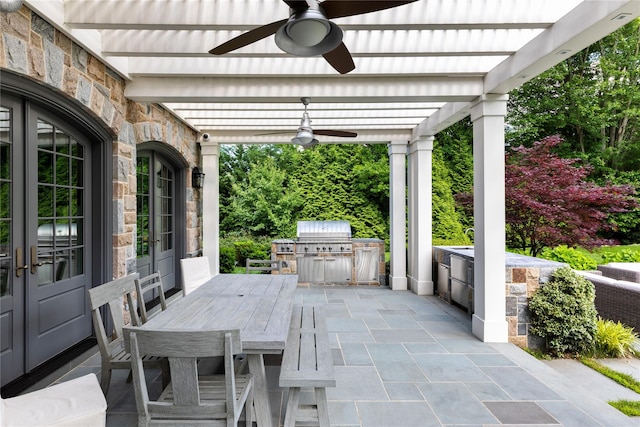 22 Terrace Ct, Old Westbury, NY 11568 - view of patio / terrace with outdoor dining space, ceiling fan, and an outdoor kitchen