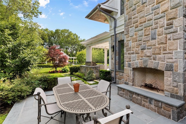 22 Terrace Ct, Old Westbury, NY 11568 - view of patio with an outdoor stone fireplace and outdoor dining area
