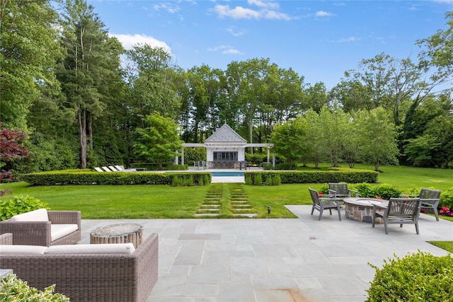 22 Terrace Ct, Old Westbury, NY 11568 - view of patio / terrace with an outdoor fire pit, a swimming pool, and view of scattered trees