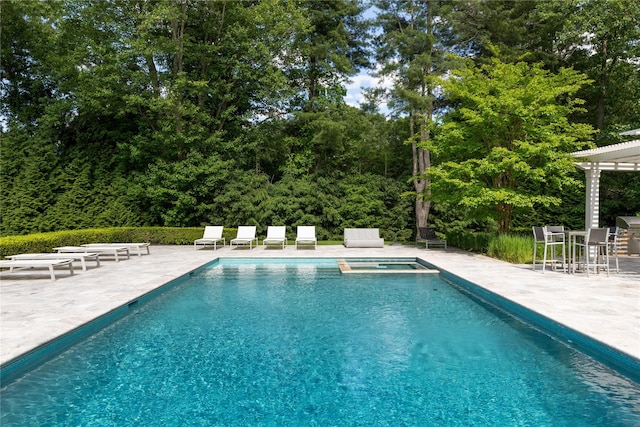 22 Terrace Ct, Old Westbury, NY 11568 - view of pool featuring a patio, a pool with connected hot tub, and outdoor dining area