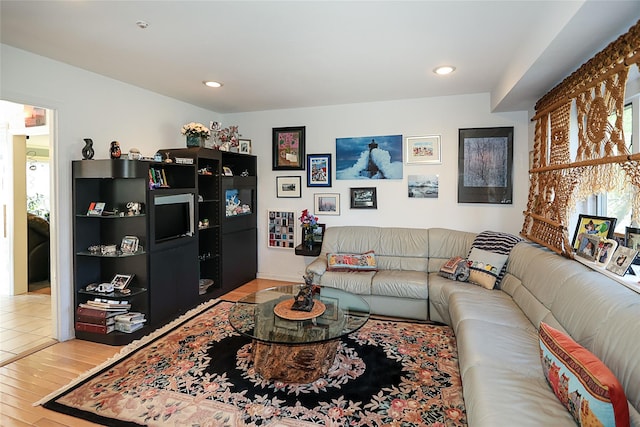 12 Rustic Gate Ln, Dix Hills, NY 11746 - living area with wood finished floors, recessed lighting, and healthy amount of natural light