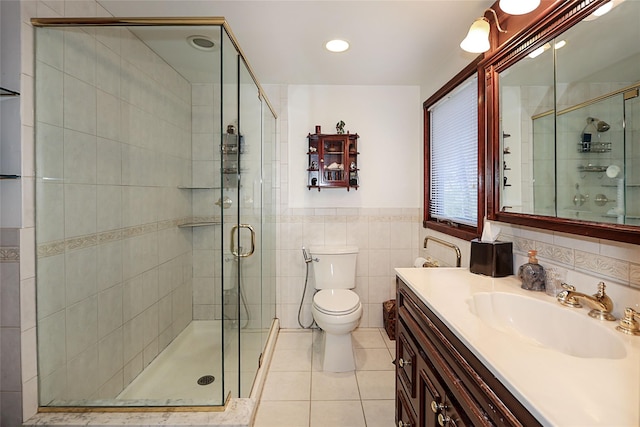 12 Rustic Gate Ln, Dix Hills, NY 11746 - bathroom with vanity, tile walls, a stall shower, toilet, and tile patterned floors
