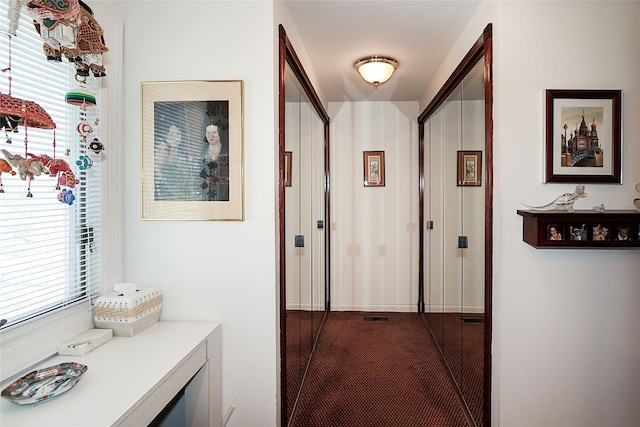 12 Rustic Gate Ln, Dix Hills, NY 11746 - corridor with dark carpet