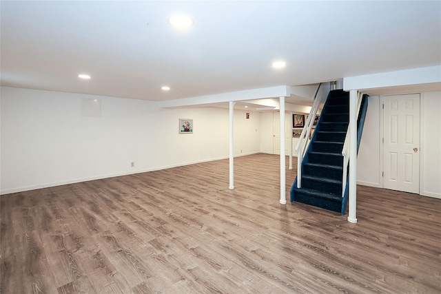 12 Rustic Gate Ln, Dix Hills, NY 11746 - finished basement with wood finished floors, recessed lighting, stairway, and baseboards