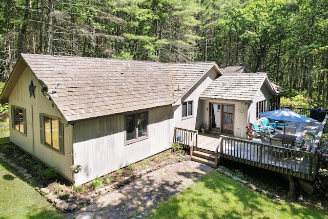 141 Mountain Laurel Ln, Glen Spey, NY 12737 - view of front of property featuring a wooden deck and a view of trees