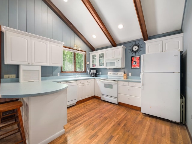 141 Mountain Laurel Ln, Glen Spey, NY 12737 - kitchen featuring white appliances, a peninsula, white cabinetry, and light wood finished floors