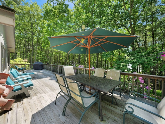 141 Mountain Laurel Ln, Glen Spey, NY 12737 - wooden terrace with outdoor dining area