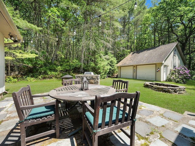 141 Mountain Laurel Ln, Glen Spey, NY 12737 - view of patio featuring outdoor dining space, an outdoor structure, and a detached garage
