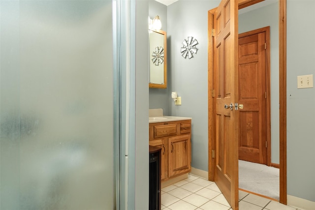 532 Wilbur Hill Rd, Unadilla, NY 13849 - bathroom with vanity, tile patterned flooring, and baseboards