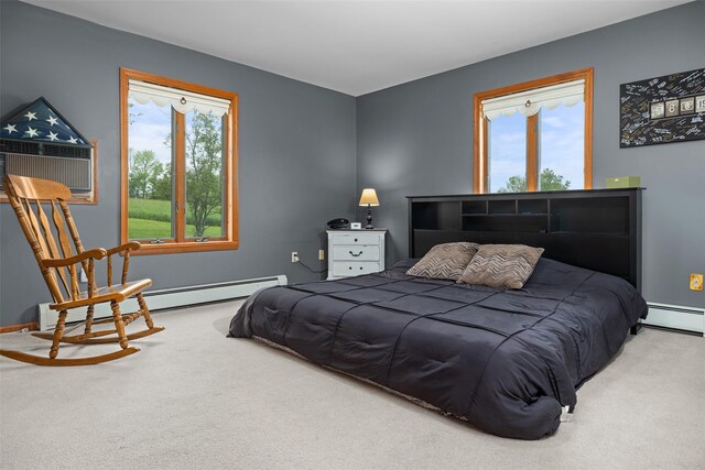 532 Wilbur Hill Rd, Unadilla, NY 13849 - carpeted bedroom featuring multiple windows, a baseboard heating unit, and cooling unit