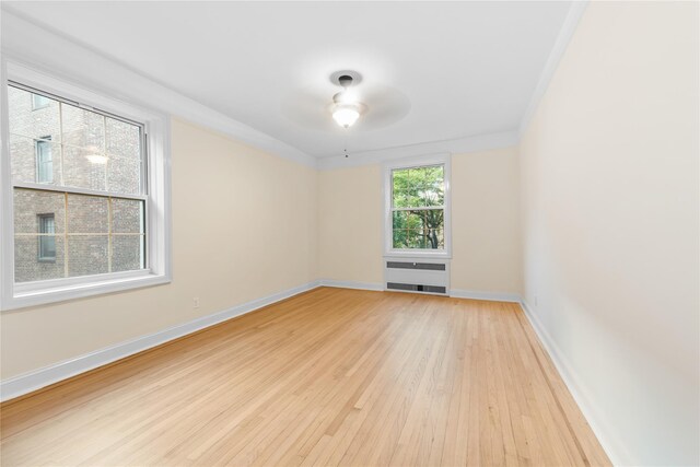 11007 73rd Rd Unit 4D, Forest Hills, NY 11375 - unfurnished room featuring light wood-type flooring, baseboards, and a ceiling fan