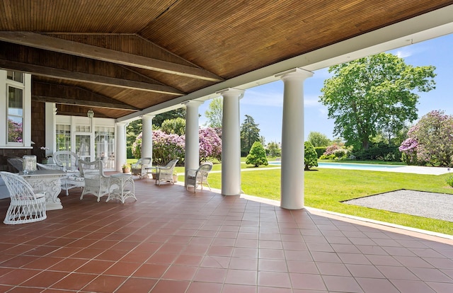 107 Quogue St, Quogue, NY 11959 - porch featuring a yard