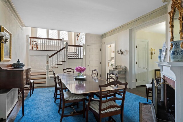 107 Quogue St, Quogue, NY 11959 - dining space with stairs and a fireplace with flush hearth