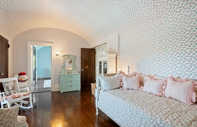 107 Quogue St, Quogue, NY 11959 - bedroom featuring radiator, wallpapered walls, and wood-type flooring