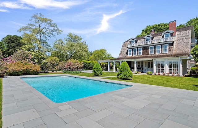 107 Quogue St, Quogue, NY 11959 - outdoor pool with a lawn and a patio area