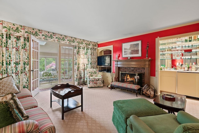 24 Wellington Rd, Locust Valley, NY 11560 - living area featuring wallpapered walls, carpet floors, a fireplace, and wainscoting