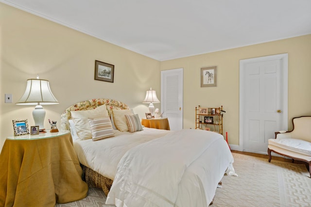 24 Wellington Rd, Locust Valley, NY 11560 - bedroom with baseboards and light wood finished floors